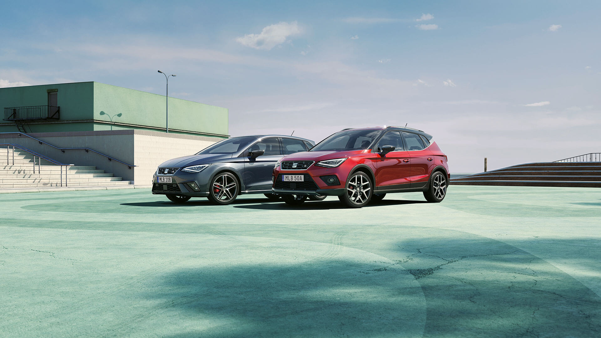 Tva Parkerade Bilar En SEAT Ibiza Och En SEAT Arona